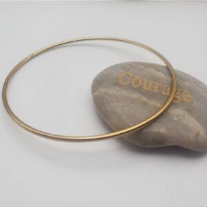 Gold toned bracelet‎ slider